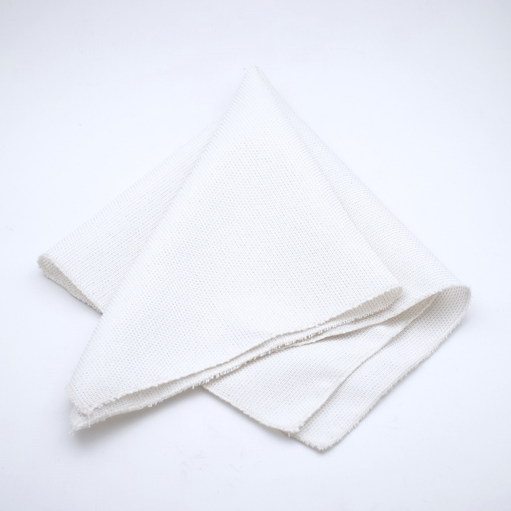Servilleta blanca yute con hilos dorados